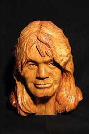 Looking for a wood carver to carve a heart with name into a tree