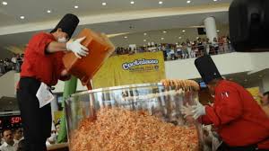 Pink, white, brown, and red. World Record For Biggest Prawn Cocktail