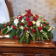 Colours such as oranges, yellows. Alabama Casket Spray House Of Flowers