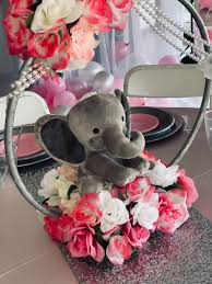 And you definitely won't go wrong with these backdrops. Elephant Hoop Floral Centerpiece Elephant Baby Shower Theme Girl Baby Shower Centerpieces Elephant Baby Shower Centerpieces