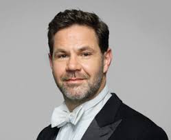 GLOWING BRASS IN THE CITY