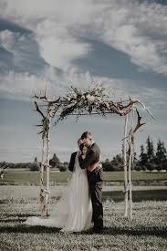 Column rentals for your wedding day. Floral Ceremony Arches For Every Wedding Style Junebug Weddings