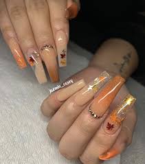 This is basically a course for those who have issue with their nails like if somebody's nails are not growing or if growing then the shapes are not proper. Fall Acrylic Nails Ideas Orange Gold And Tan Coffin Nails With Leaves And Rhinestones Coffin Nails Designs Fall Acrylic Nails Fake Nails