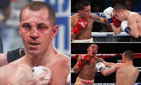 Scott Quigg beaten by Oscar Valdez in pouring rain