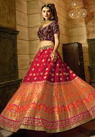 Indian wedding dresses are known for their vibrant colors, intricate patterns and ornate beading. Buy Red Peach And Purple Indian Wedding Banarasi Silk Lehenga In Uk Usa And Canada
