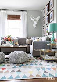 White couches and glass coffee tables are timeless pieces, but aren't so practical with a young family. 50 Ways To Decorate Your Home With Kids In Mind