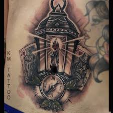 This soothing design of lanterns and butterflies against light blue clouds portrays the joy of festivals. 51 Latest Lantern Tattoos Collection