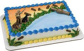 We've decorated this dessert with a lightly flavored vanilla icing to keep this colorful surprise a secret until you cut the first slice. Amazon Com Decopac Duck Hunting Decoset Cake Decoration Topper Toys Games