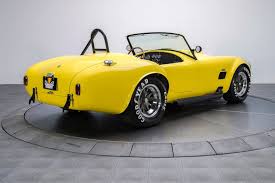 Image result for Canary Yellow 1965 AC Cars