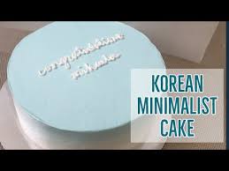 Hand scultptured blue flowers or decorative scrolls made with icing or a combination of all of these. Korean Minimalist Cake Ombre Colored Whipped Cream Easy For Beginners The Buttercream Diva Youtube