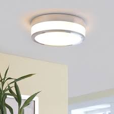 Ceiling exposed coffered 'waffle' concrete slab treated timber fins and vertical timber panels with recessed lights. Bathroom Lights Bathroom Light Fixtures Lights Ie