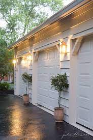 Easy Outdoor Decorating And Design Via Julieblanner Garage Decor Garage Lighting House Exterior