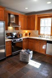 Engineered quartz countertops by caesarstone cabinets. Summer Update The Living With Less Project Oak Kitchen Kitchen Design Kitchen Floor Tile