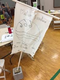 It's a relay race where the boys line up in two teams, and go toe to toe throwing their shoes at a standing water bottle while standing on a chair. Water Bottle Relay Race A Shoe Game Tip Junkie