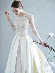 A Vintage Inspired Long Sleeve Wedding Dress From Ray Co Featuring Precious Pearl Embellishments Wedding Dress Long Sleeve Sleeve Wedding Dress Wedding Dresses Lace
