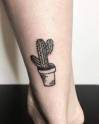 Cactus tattoos can be cartoonish, realistic, monochromatic, and can be bordered with meaningful texts. Cactus Tattoo By Lisa Pokes Tattoogrid Net