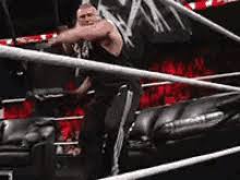 An explosive ambulance match at elimination chamber looms large. Wwe Chair Gifs Tenor