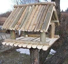 Make A Quick And Easy Birdtable Out Of Thin Branches Homemade Bird Houses Wooden Bird Feeders Bird House Kits
