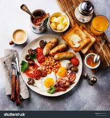 Full English Breakfast With Fried Eggs Sausages Bacon Beans Toasts And Coffee Healthy Recipes Easy Snacks Fried Breakfast Healthy Snacks Recipes