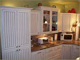 Add beadboard to kitchen cabinets. White Solid Wood Kitchen Cabinet With Beadboard Door Panel Combined With Clear Coating Wooden Butcher Block Top Diy Schrankturen Schrank Kuche Massivholzkuchen