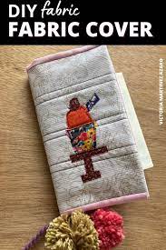 The first step is to measure your book and get all the dimensions you need including room for the also, there is this website that shows you how to make a reversible book cover. How To Make A Book Cover Using Applique Bernina Blog