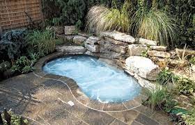 Waterfalls keep the pool from remaining stagnant and attracting unwanted debris. Small Pools For Small Backyards As A Mini Pool For A Family With Young Children The Plunge Poo Hot Tub Backyard Small Backyard Pools Pools For Small Yards