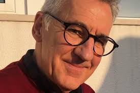 Eastbourne father visits Buckingham Palace to receive honour