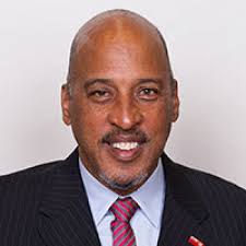 The Hon. Nelson Cole Simons, JP, MP