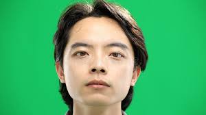 Guy's Face Green Background Close Up Stock Photos