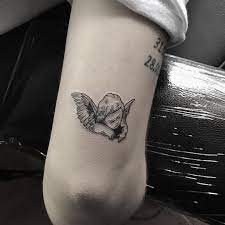 21 Charming Angel Tattoos Most Popular Designs Of 2019 Page 20 Of 21 Tracesofmybody Com Tattoos For Women Small Tattoos Tattoo Designs For Women