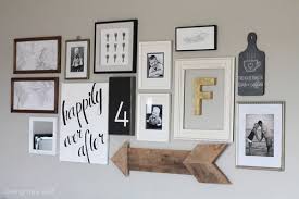 Photo Frame Wall Tumblr Google Search Gallery Wall Living Room Decor Inspiration Wall Without the two framed pieces, though, the shelves might look unfinished.