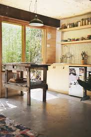 Studio apartments are simpler versions that do not have walls separating the sleeping area and the gathering space. Outbuilding Of The Week Garage Turned Studio Apartment Gardenista