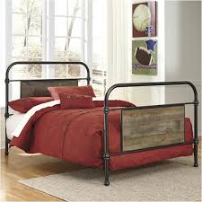 Tops of cases and headboard/footboard panels are captured with a nail trimmed corner piece; B446 71 Ashley Furniture Twin Metal Headboard Footboard Rails
