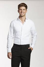 Undershirts For Men A Groomsman Guide On How To Wear An Undershirt With A Suit Or Tuxedo Mens Undershirts Stylish Suit Groomsmen Suits