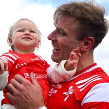 Conor Grimes of Louth GAA celebrates with his daughter Izzy, aged one,  after his side's triumph over Kildare in the Leinster SFC semi-final  against Kildare at Glenisk O'Connor Park in Tullamore. Photo: