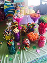 Sweet, sour, and colorful, a candy bar could be the perfect addition to your sweet sixteen menu! Hawaiian Candy Table Birthday Party Candy Table Sweet 16 Birthday Party Kids Luau Parties