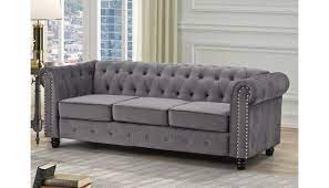Removable seat cushions with velcro attachment to help keep cushions in place. Evart Grey Velvet Chesterfield Sofa