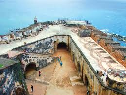 San juan puerto rico woman enjoying view el morro fort castillo de san felipe del morro strong and beautiful, this fort has helped guard the shore for nearly five centuries while overlooking some of the island's best scenery. San Juan Puerto Rico Britannica