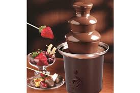 The basin is heated to keep the chocolate in a liquid state so it can be pulled into a center cylinder then. 2 Tier Stainless Steel Chocolate Fondue Fountain For Dipping Kogan Com