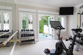 What to expect from ordering a peloton bike? Home Gym With Peloton Transitional Den Library Office