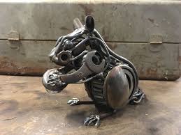 Scrap Metal Chipmunk Sculpture Made With Old Tools Car Parts Chain Flatware And Other Discarded Mate Metal Art Sculpture Metal Art Projects Scrap Metal Art