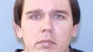 Sheriff: man shoots into home, barely missing woman