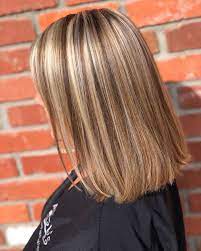 We Re Officially Obsessed With The 90s Chunky Highlights Trend That S All Over Instagram Chunky Blonde Highlights Chunky Highlights Hair Styles