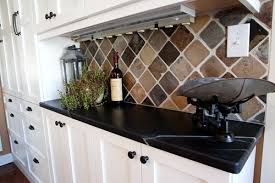 Maybe you would like to learn more about one of these? Black Soapstone Counters With Colorful Subway Tile Backsplash Crocodile Rocks