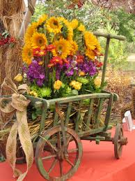 Fall Flower Arrangements By Twigs In Greenville Sc Fall Flower Arrangements Fall Flowers Flower Cart