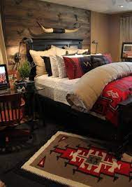 What kind of wall art does texas tech have? Master Bedroom Ralph Lauren Meets Texas Home Decor Bedroom Rustic Bedroom Eclectic Bedroom