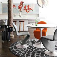 But from inside baxter's living room one can see windows in both his kitchen and bedroom facing directly where the dreyfus apartment should be (and there would likely be a window in the bathroom between the kitchen and bedroom). Dining Room With Iconic 1960s Table Deniz Home