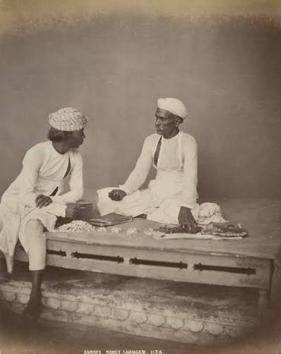 RBSI - Shroffs, Money Changers - 1863 Studio portrait of shroffs or money changers at Delhi in India, taken by Shepherd and Robertson in c.1863. This image of two men, seated with