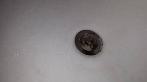 gurgling at bathtub drain when toilet