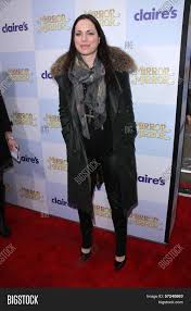 She is popular for being a movie actress. Kristin Minter Mirror Image Photo Free Trial Bigstock